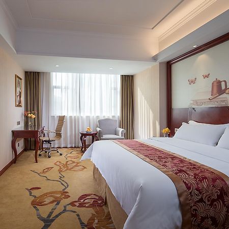 Vienna Hotel Zhongshan Guzhen Town Center Exterior photo
